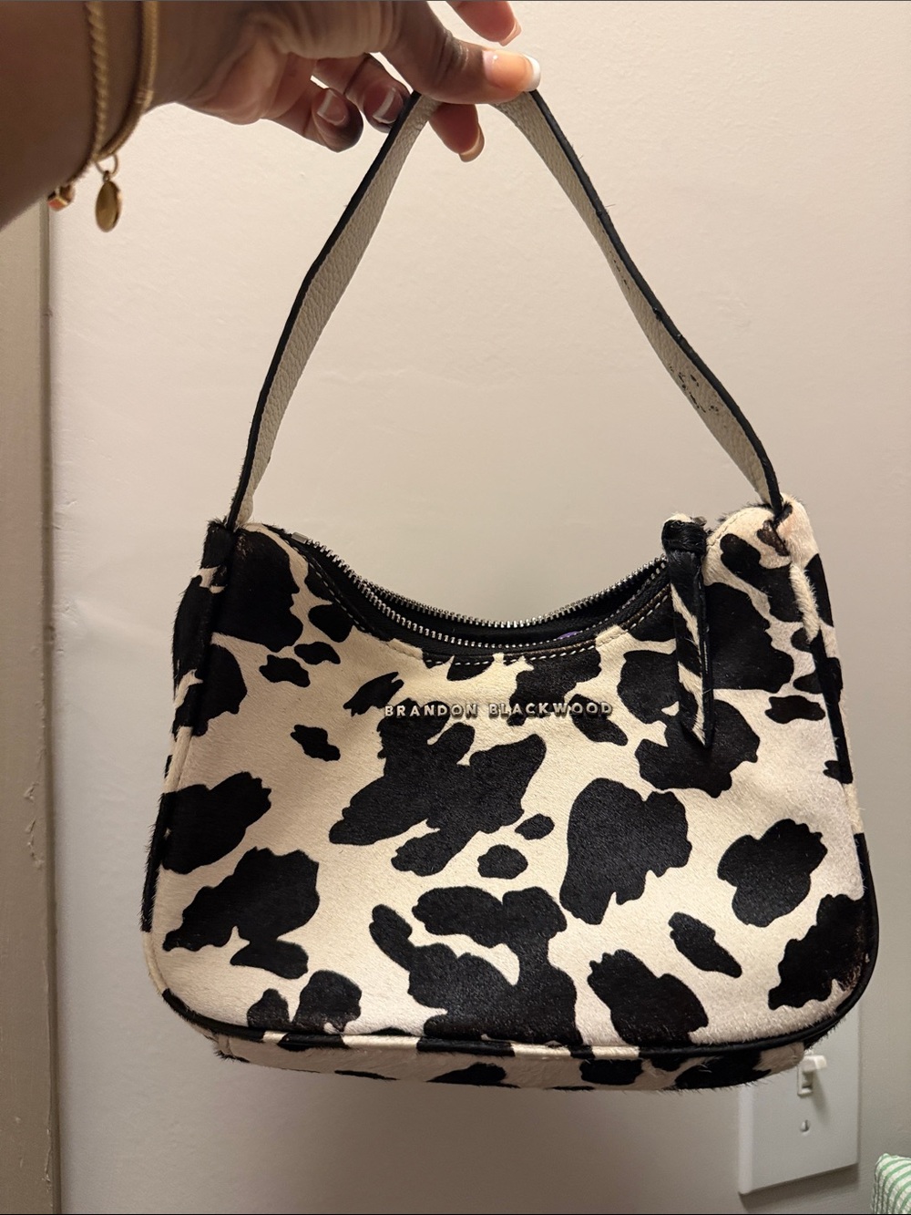 Brandon Blackwood Cow Print Shoulder Bag in Black and White